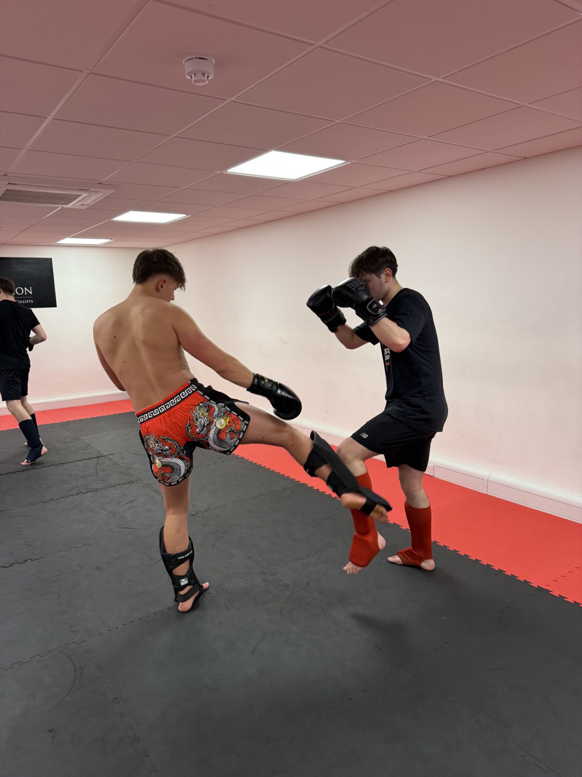 Ouroboros MMA members training as a team in Romsey