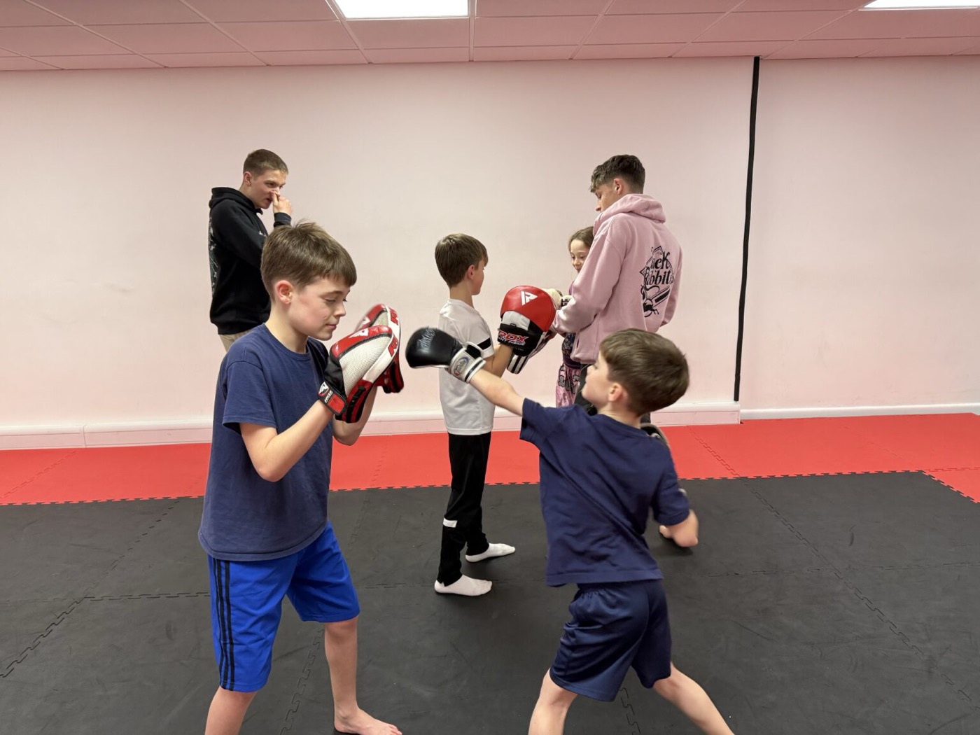 Youth martial arts coaching at Ouroboros MMA